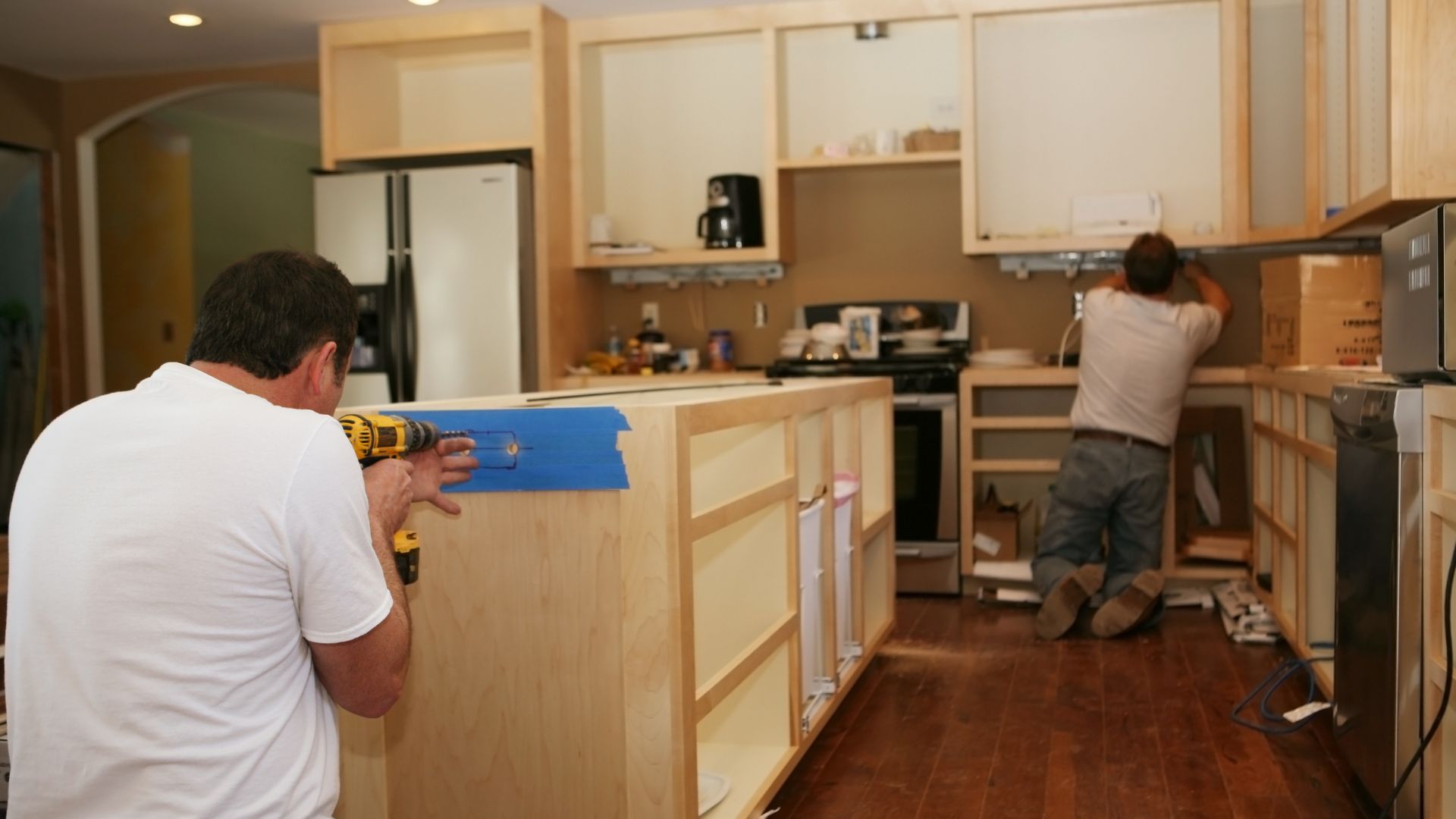 Connecticut contractors installing new cabinets during a kitchen remodel by Myers Home Improvements