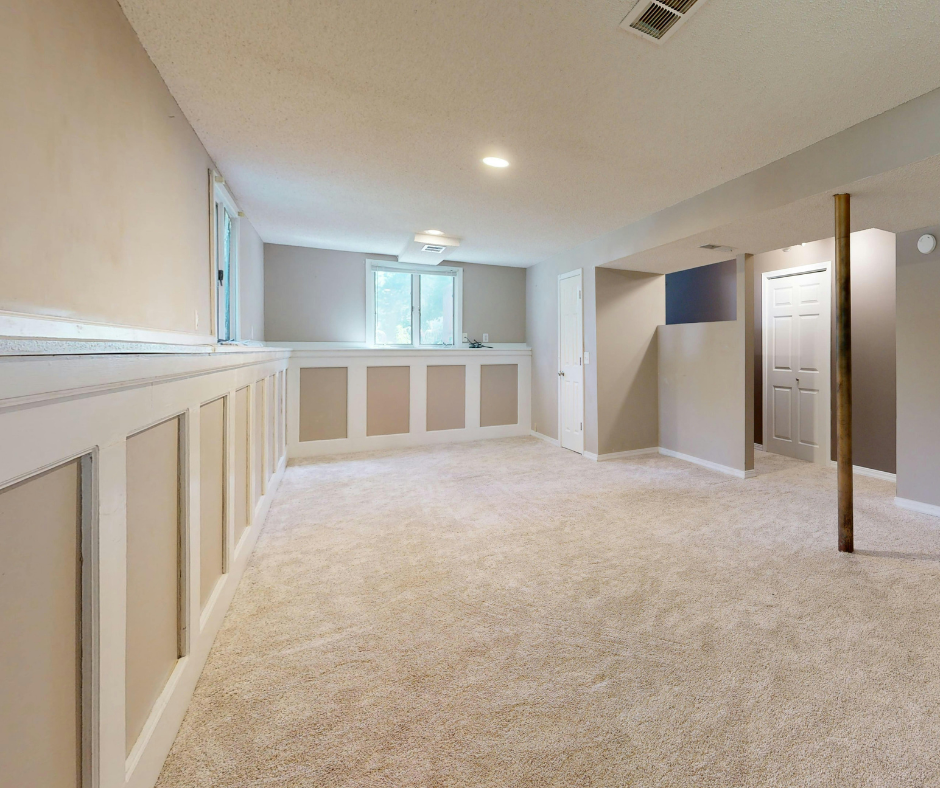 Finished basement remodeling project with carpet flooring and added living space in Connecticut