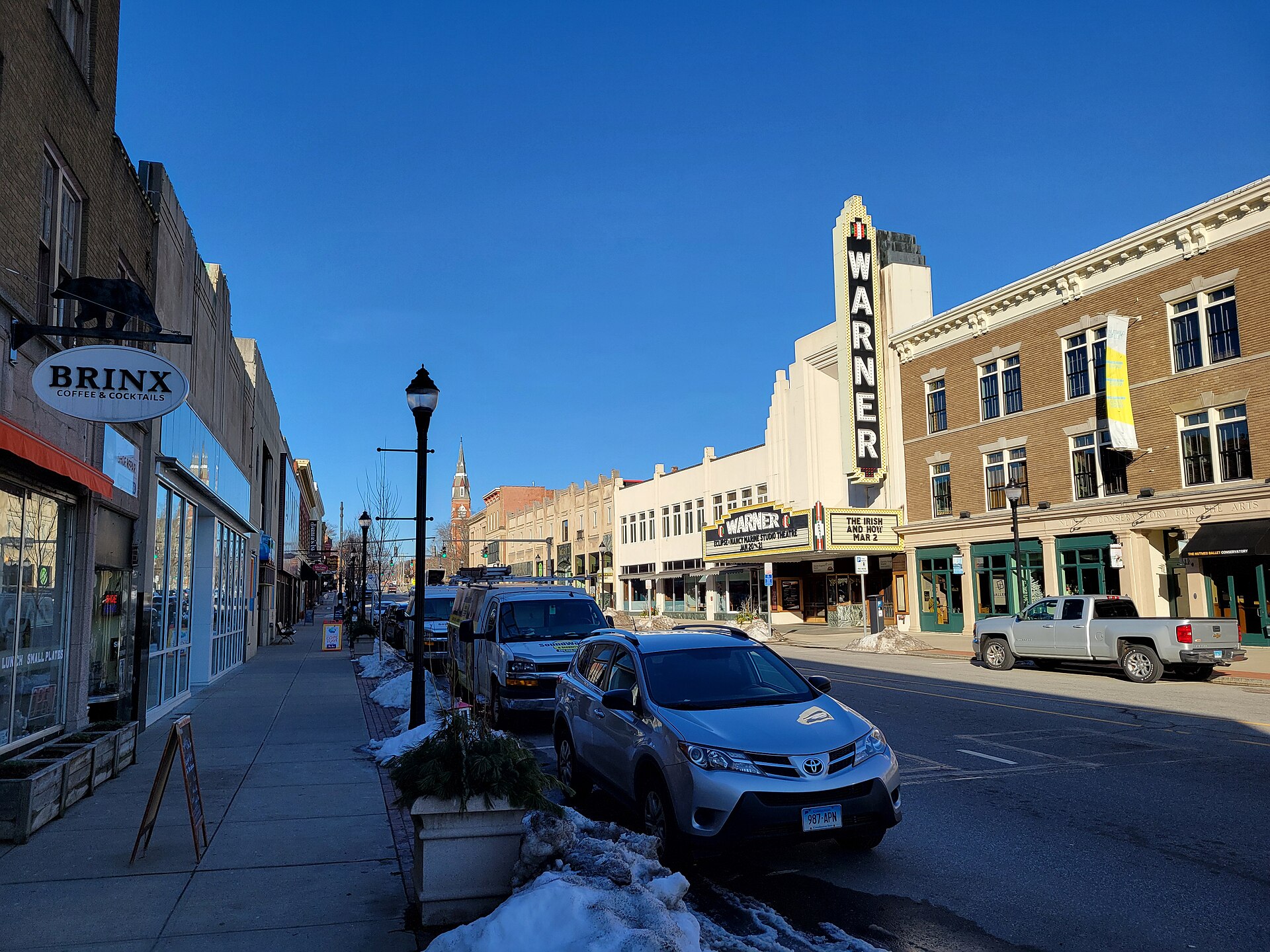 Main Street in downtown Torrington, Connecticut with the Warner Theatre marquee